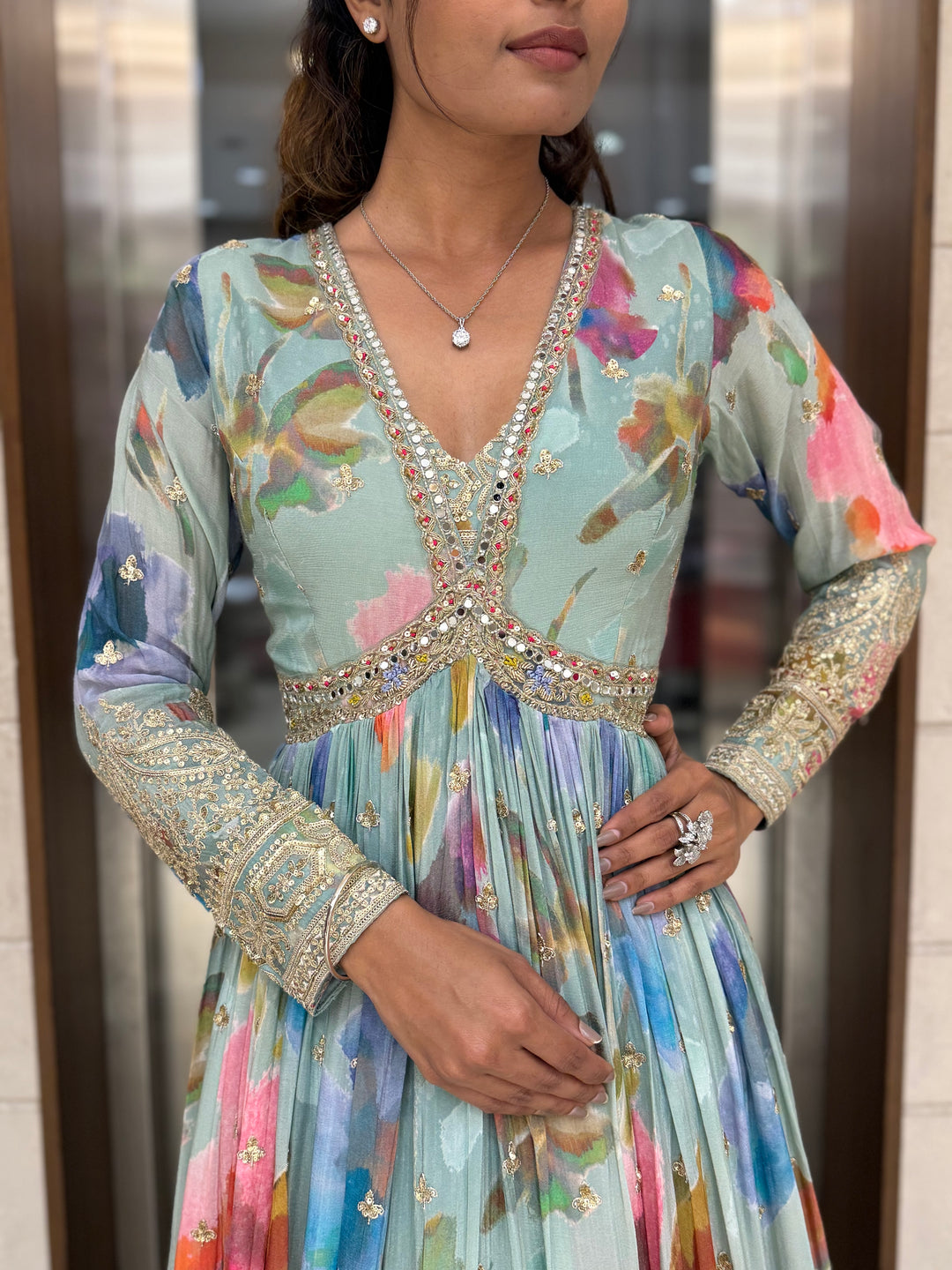 Pastel Aqua Floral Silk Anarkali Gown with Hand-Embellished Border & Elegant V-Neck Detailing