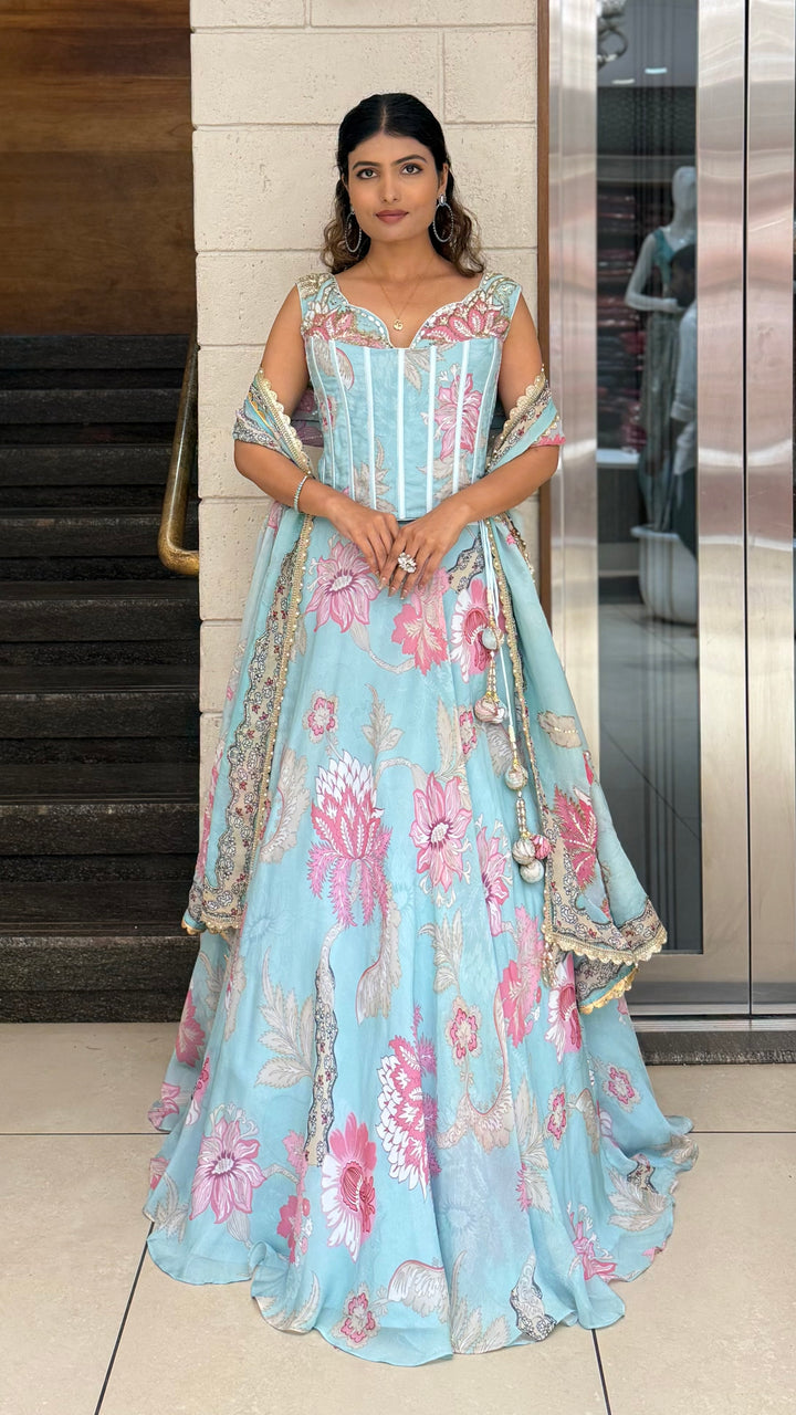 Powder Blue Floral Printed Designer Gown with Corset Bodice & Tassel Dupatta