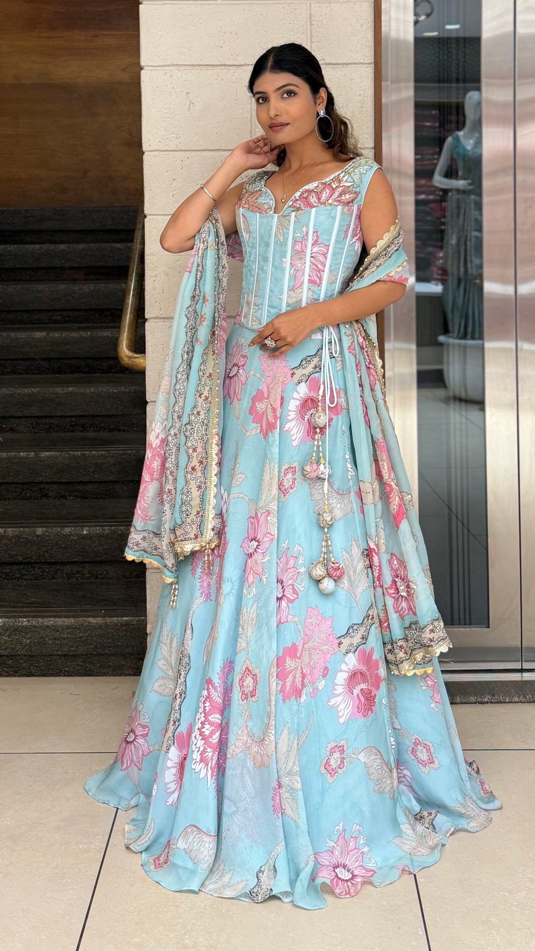 Powder Blue Floral Printed Designer Gown with Corset Bodice & Tassel Dupatta