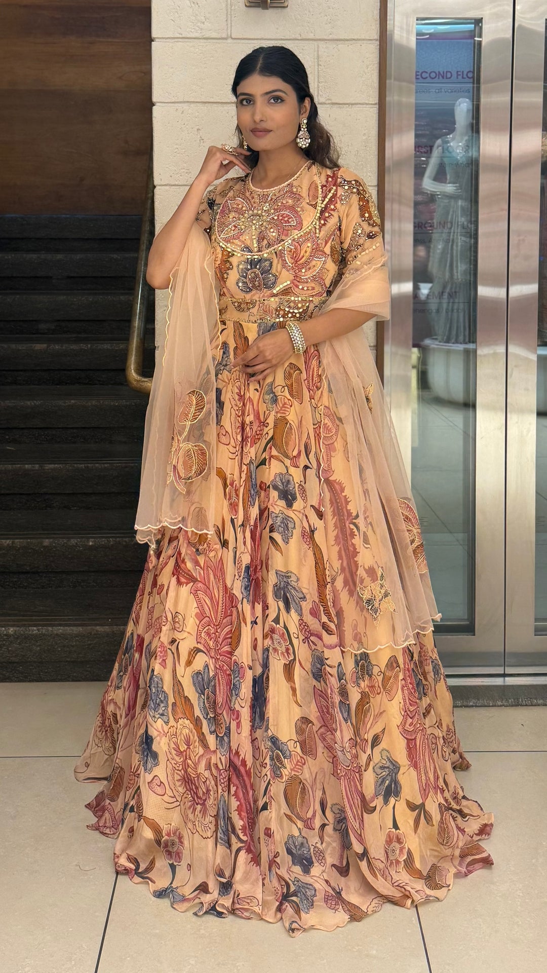 Peach Floral Printed Designer Gown with Heavy Embroidered Yoke & Net Dupatta