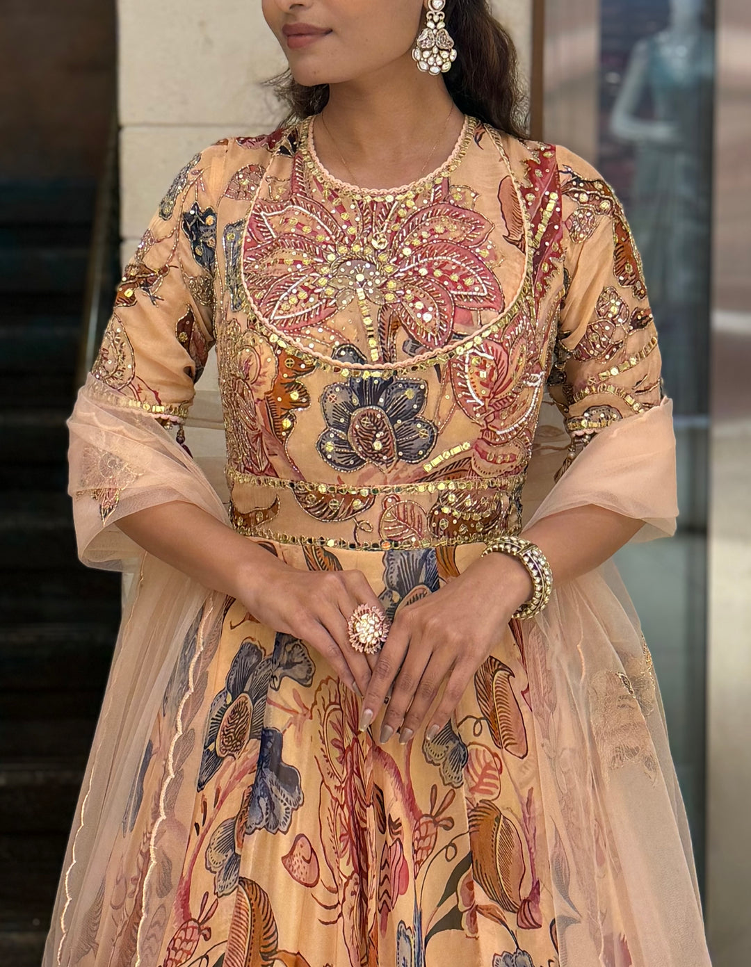 Peach Floral Printed Designer Gown with Heavy Embroidered Yoke & Net Dupatta