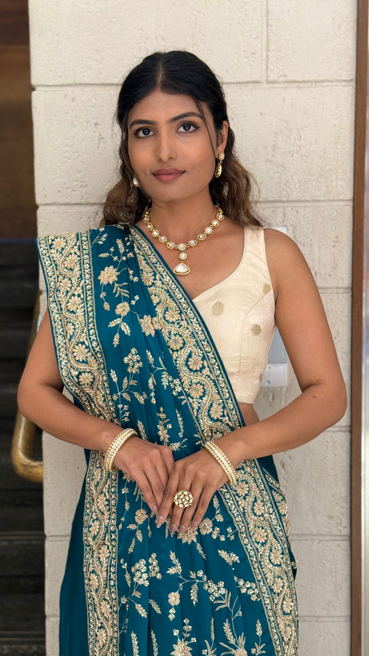 Teal Blue Heavy Embroidered Designer Saree with Gold Zari Work & Contrast Blouse