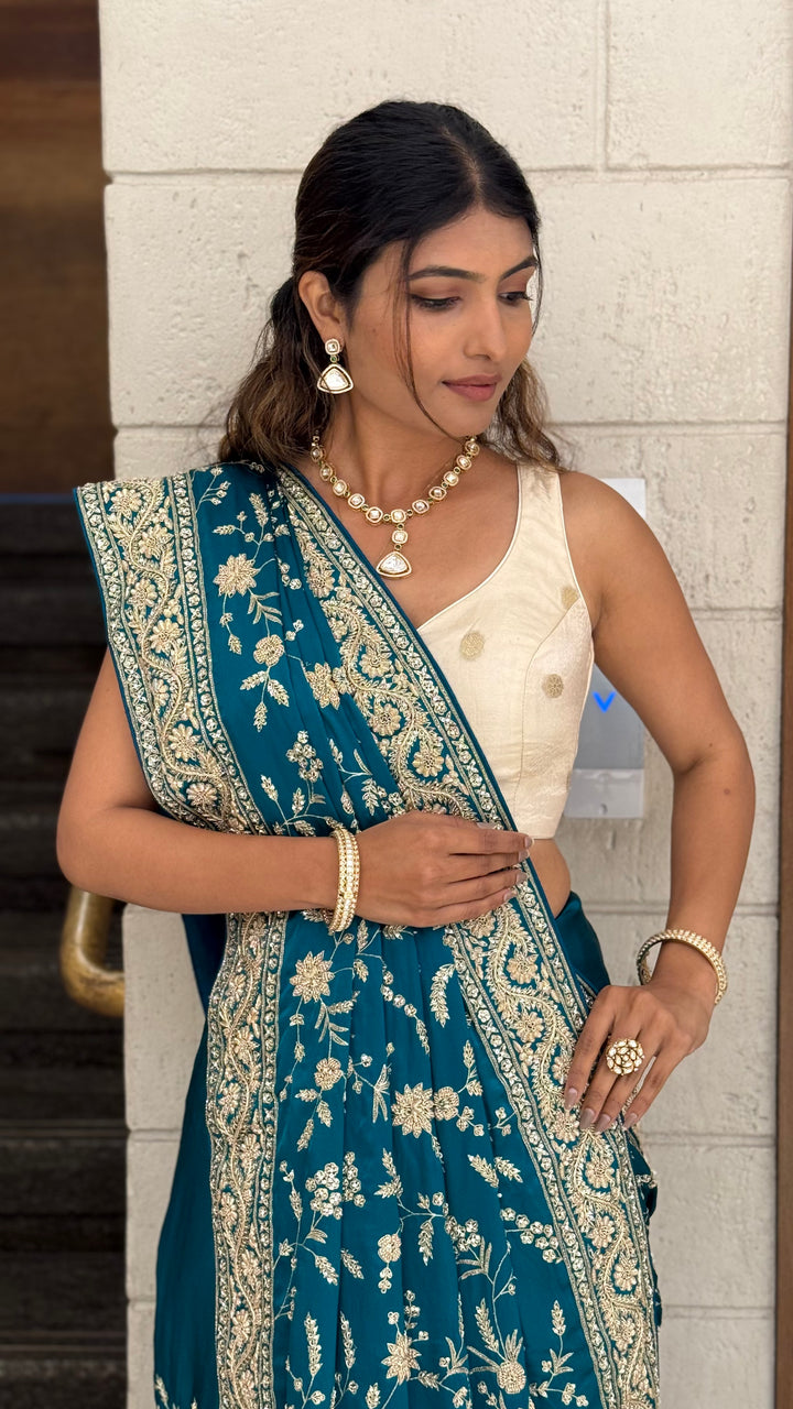 Teal Blue Heavy Embroidered Designer Saree with Gold Zari Work & Contrast Blouse