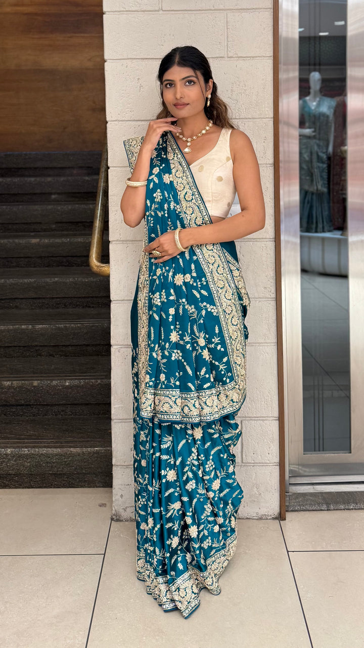 Teal Blue Heavy Embroidered Designer Saree with Gold Zari Work & Contrast Blouse