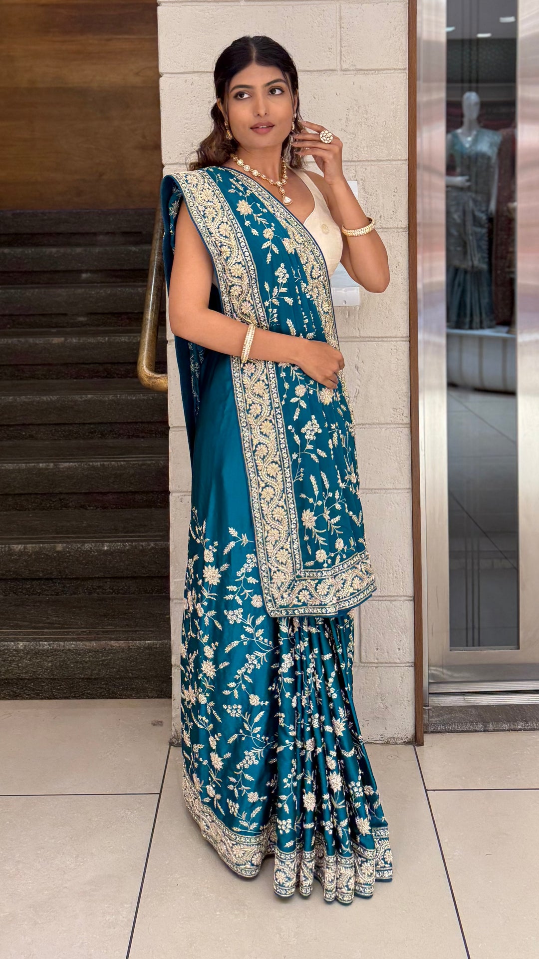 Teal Blue Heavy Embroidered Designer Saree with Gold Zari Work & Contrast Blouse