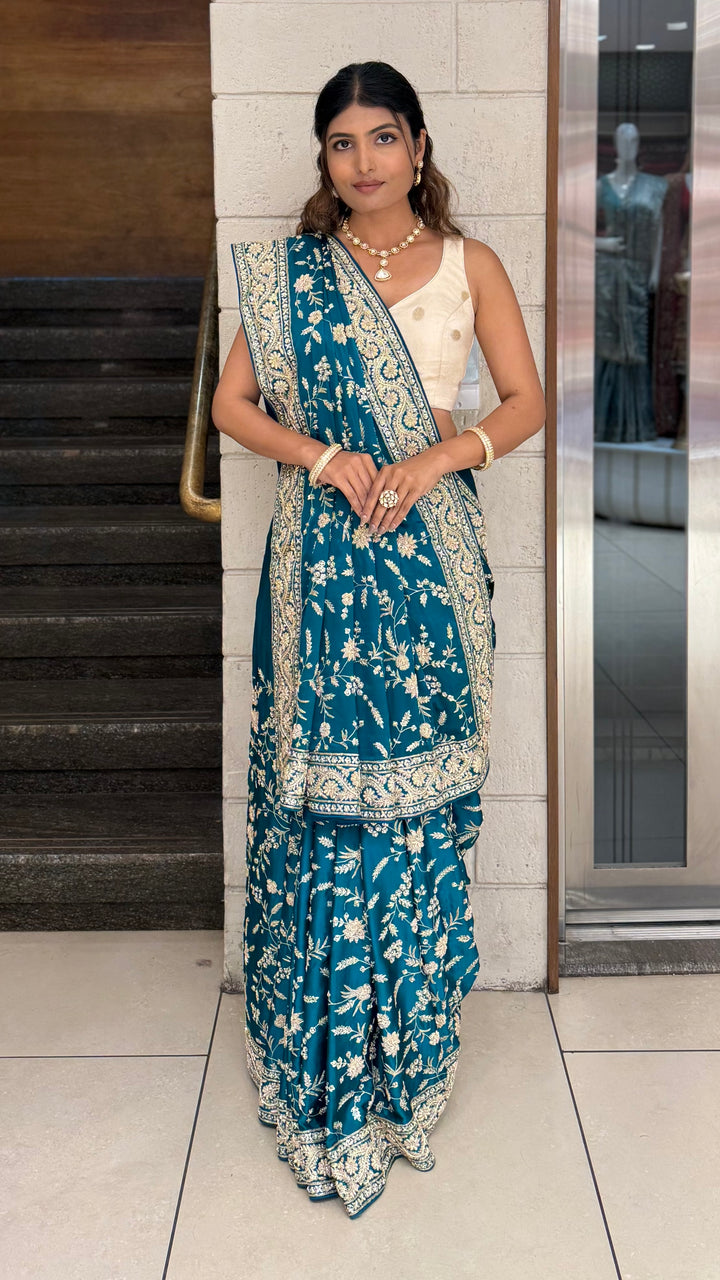 Teal Blue Heavy Embroidered Designer Saree with Gold Zari Work & Contrast Blouse