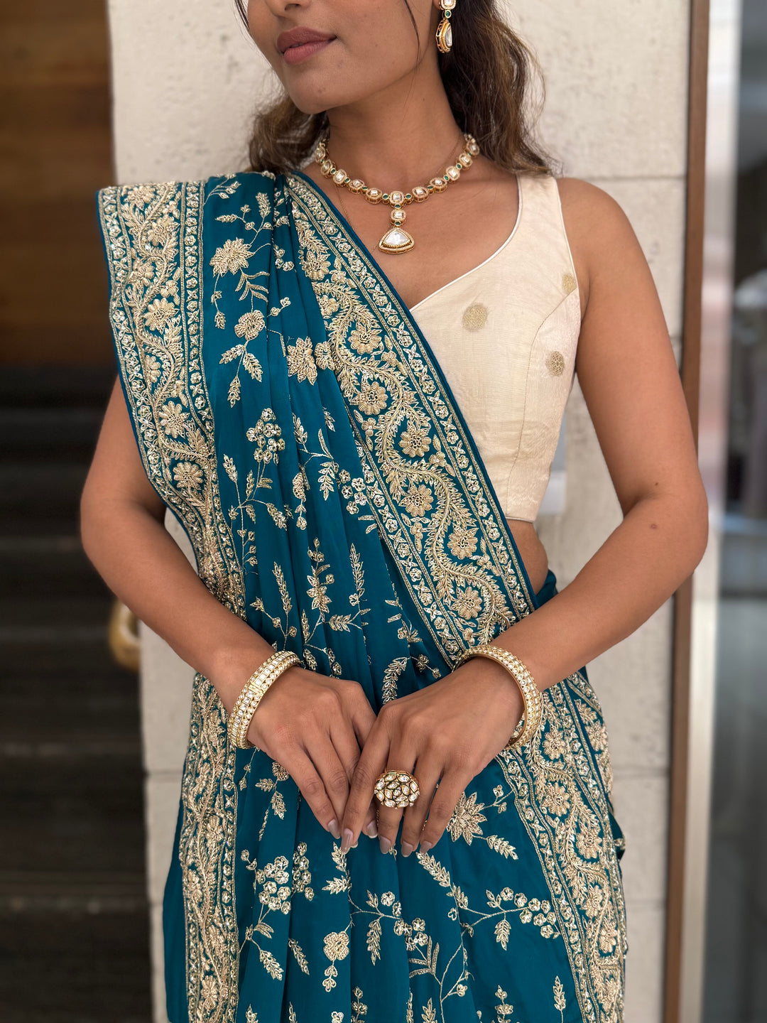 Teal Blue Heavy Embroidered Designer Saree with Gold Zari Work & Contrast Blouse