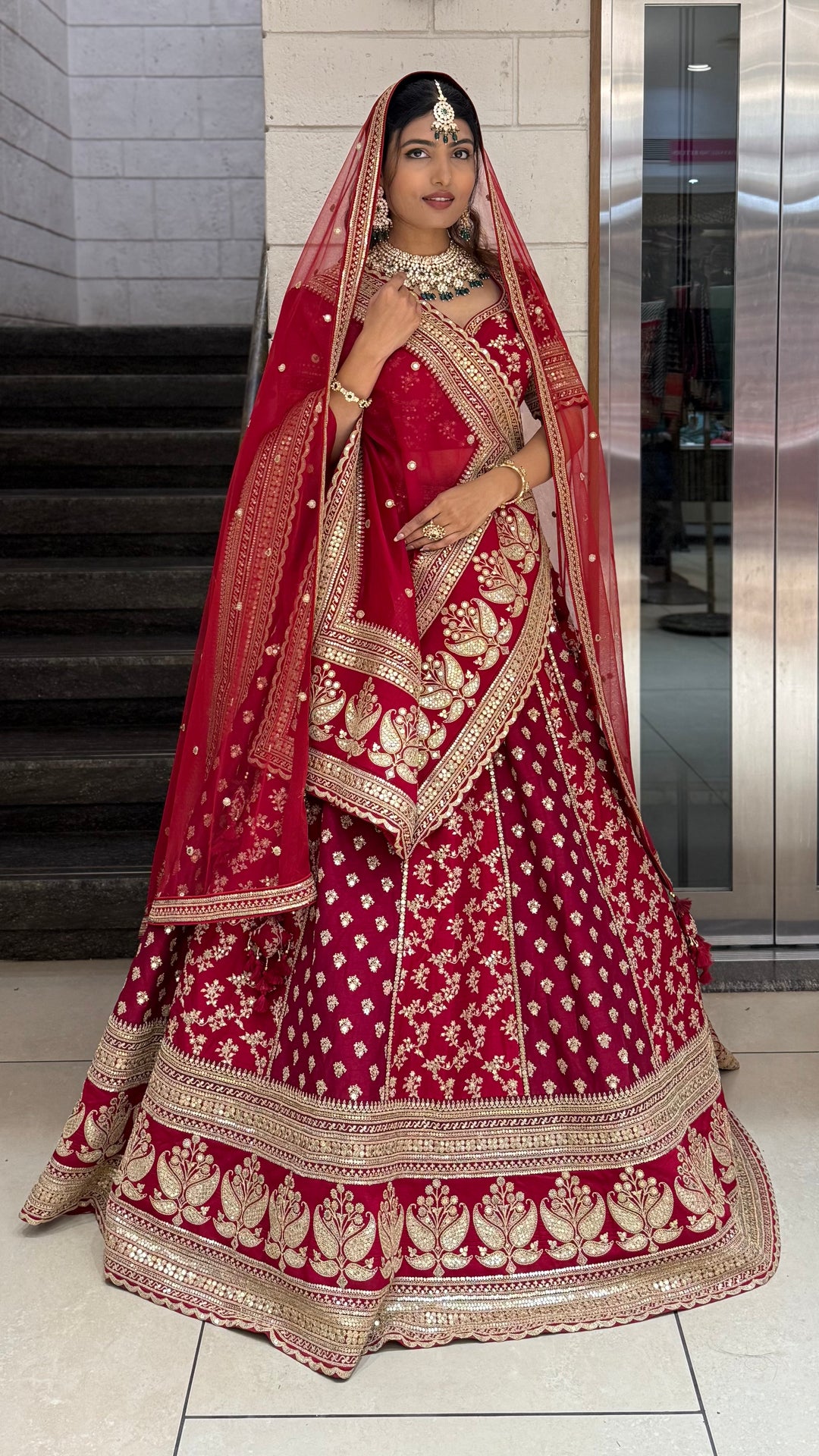 Crimson Red Heavy Embroidered Bridal Lehenga Choli with Gold Zari Work & Double Dupatta