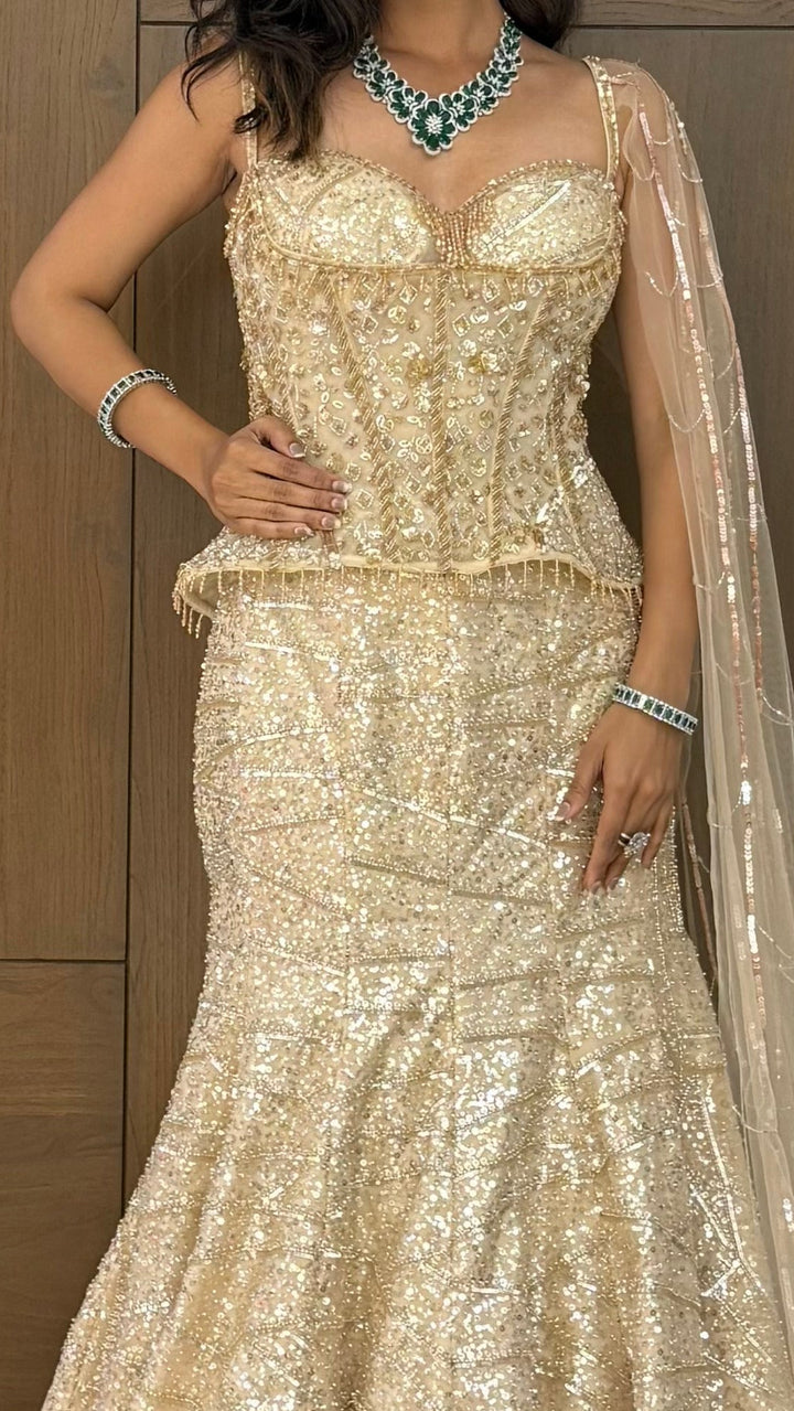 Champagne Gold Sequin Embellished Designer Lehenga Set with Corset Blouse & Sheer Net Dupatta