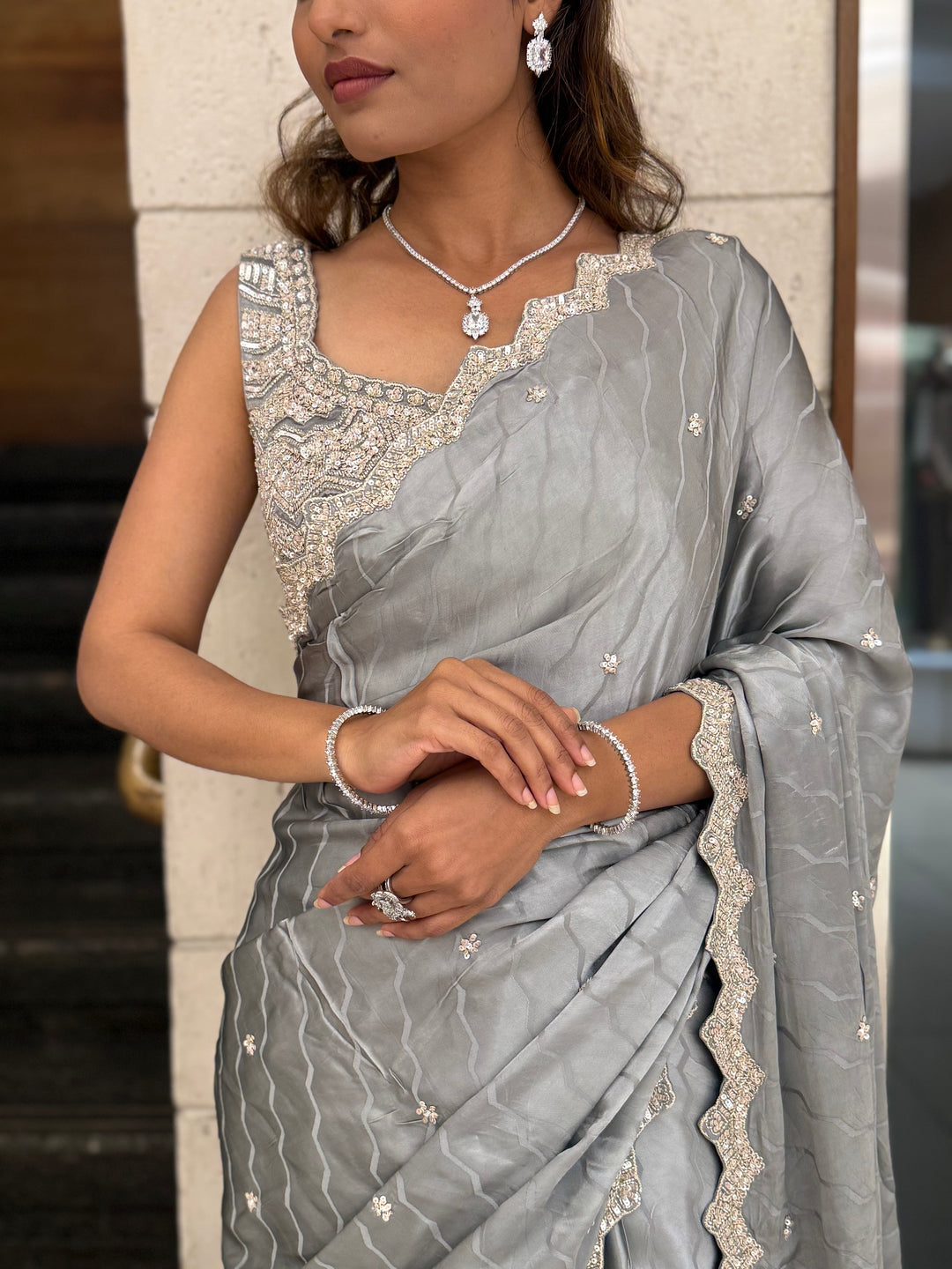 Steel Grey Soft Satin Saree with Delicate Embroidery & Scalloped Border