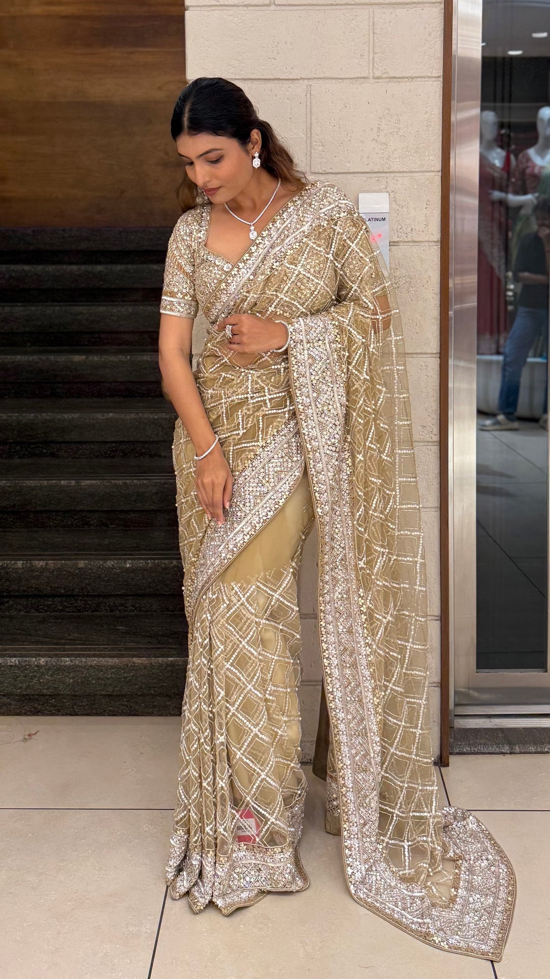 Champagne Gold Heavy Embroidered Net Saree with Matching Blouse