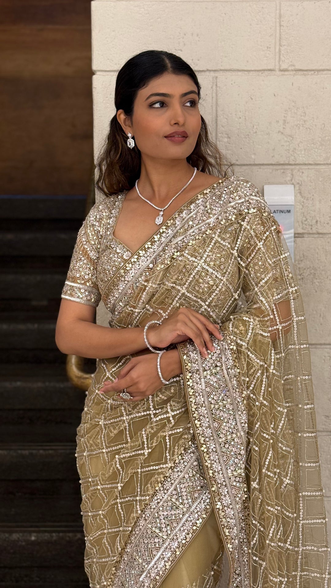 Champagne Gold Heavy Embroidered Net Saree with Matching Blouse