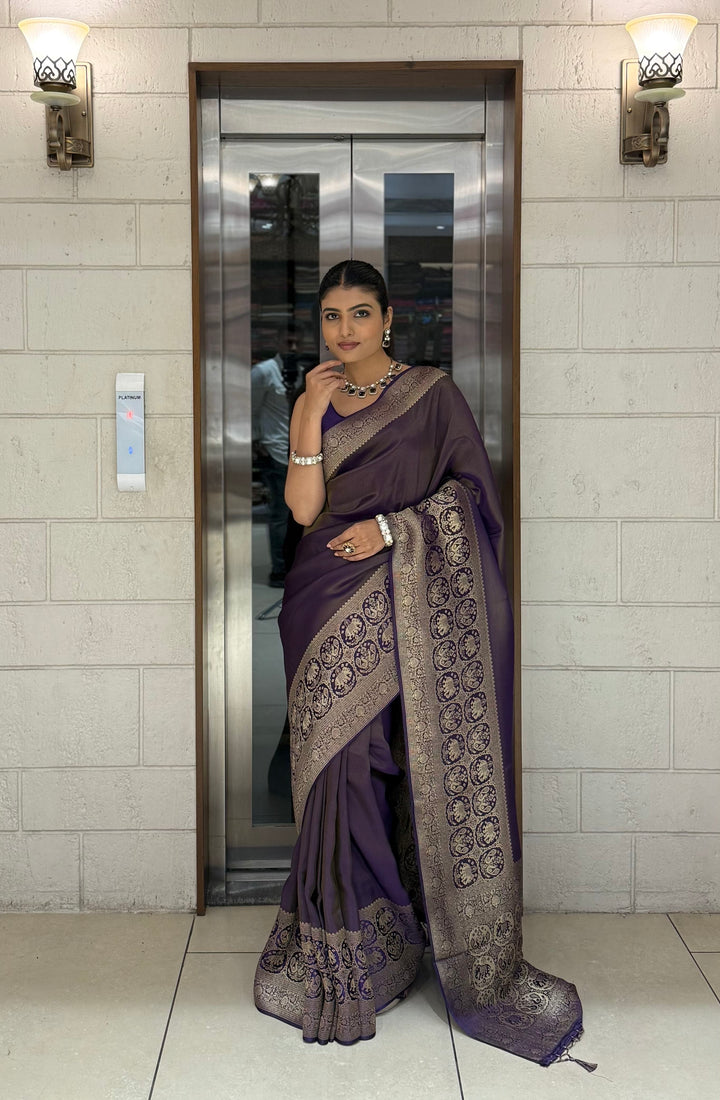 Majestic Plum Kanjivaram Silk Saree with Antique Zari Border & Traditional Motifs