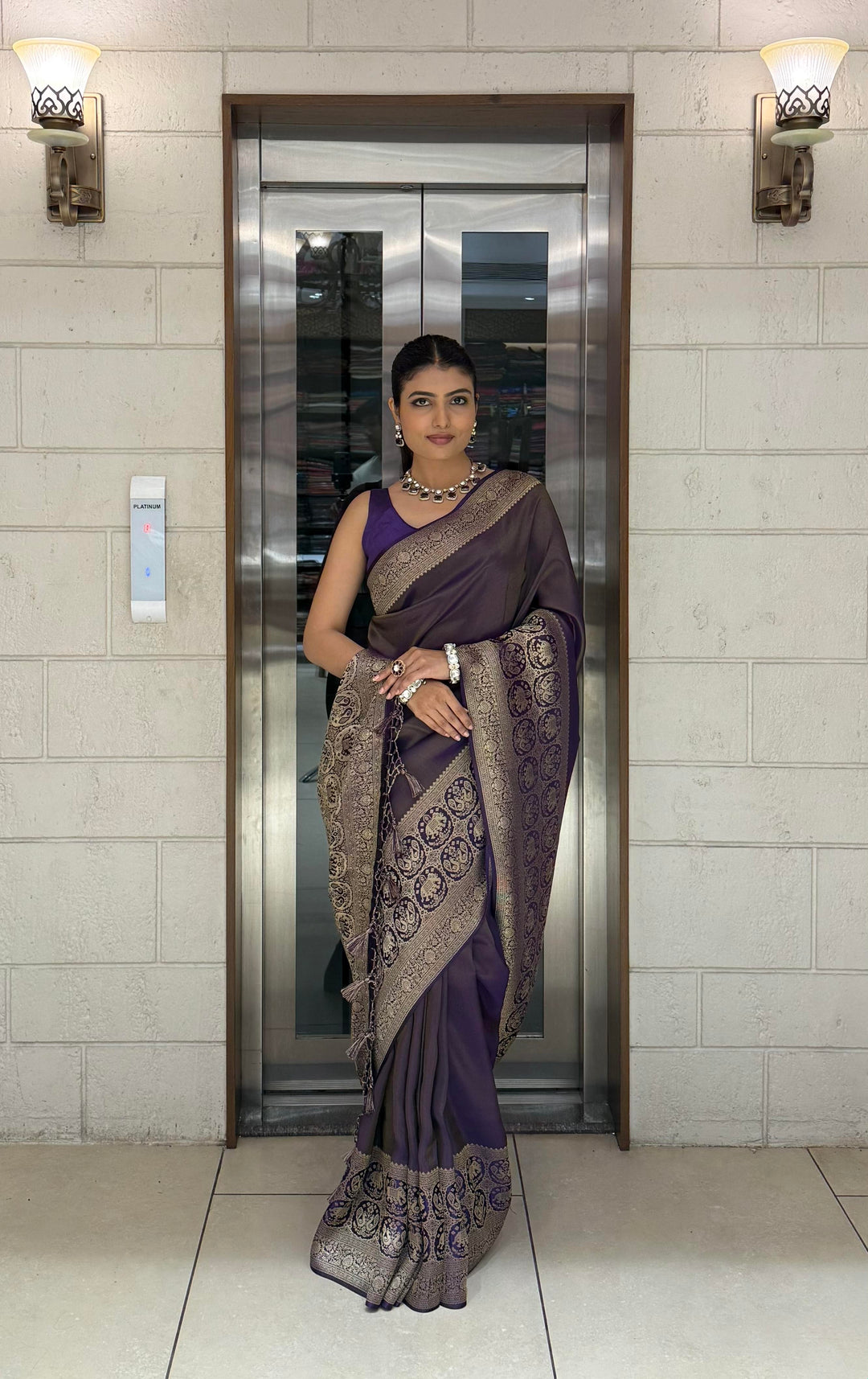 Majestic Plum Kanjivaram Silk Saree with Antique Zari Border & Traditional Motifs