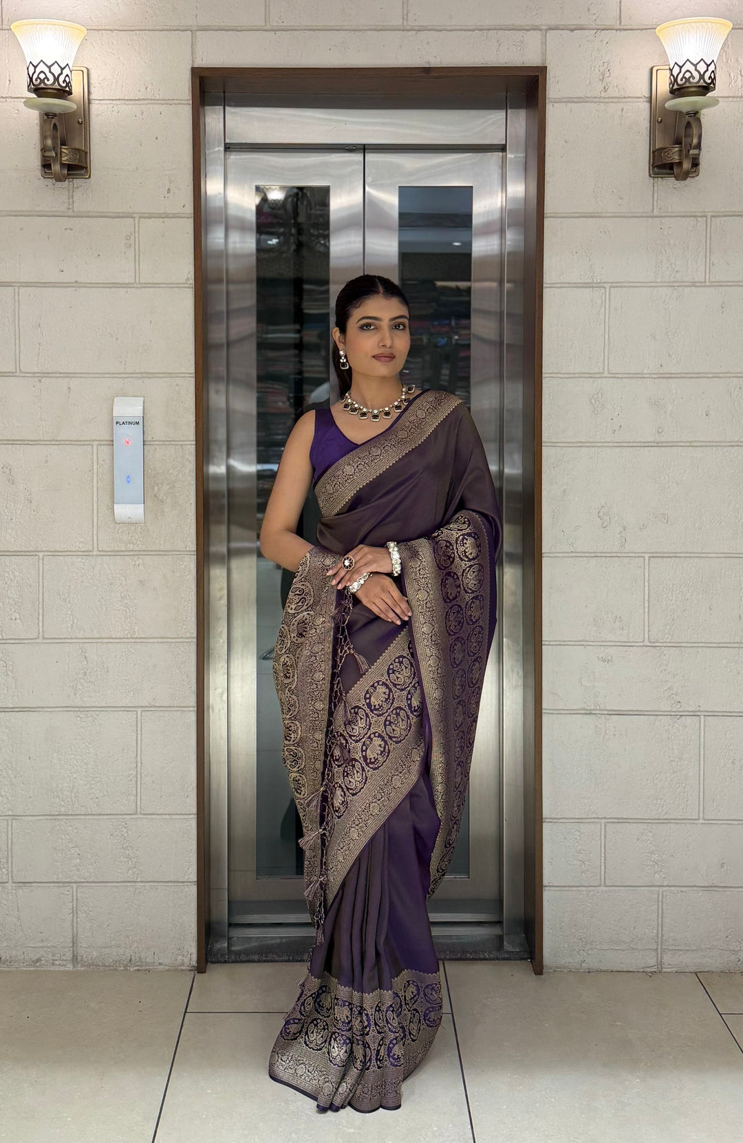 Majestic Plum Kanjivaram Silk Saree with Antique Zari Border & Traditional Motifs
