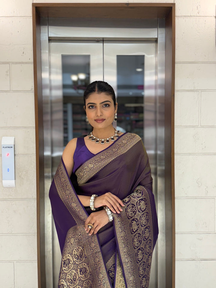 Majestic Plum Kanjivaram Silk Saree with Antique Zari Border & Traditional Motifs