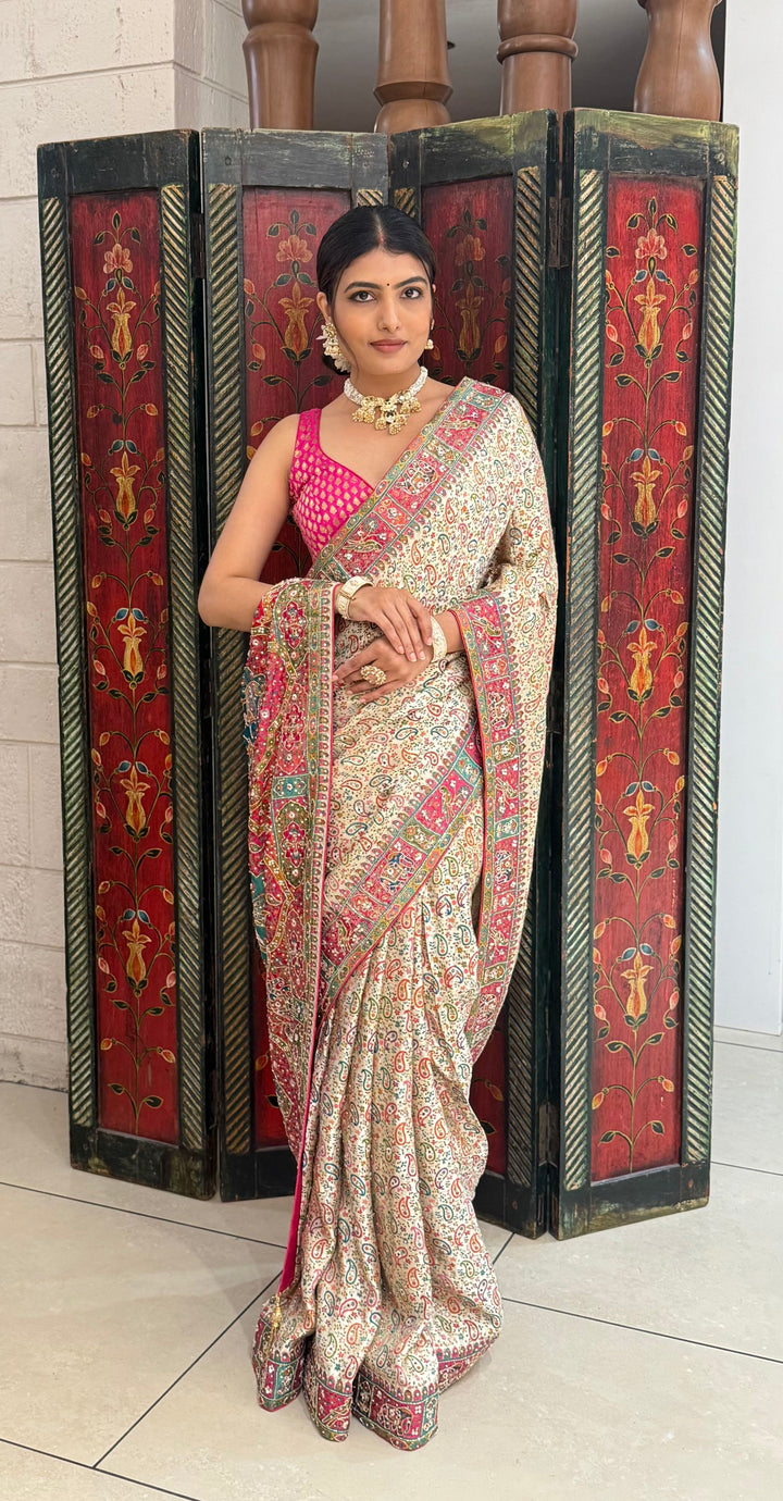 Regal Cream Banarasi Silk Saree with Multicolor Meenakari Weaving & Contrast Pink Border