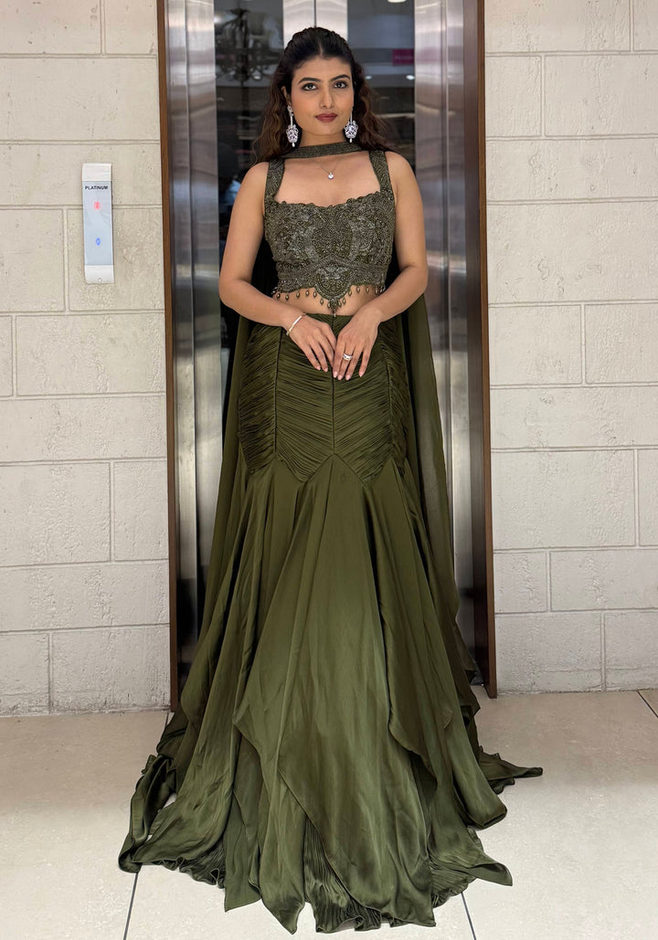 Olive Green Indo-Western Mermaid Gown with Embellished Corset & Draped Cape Sleeves