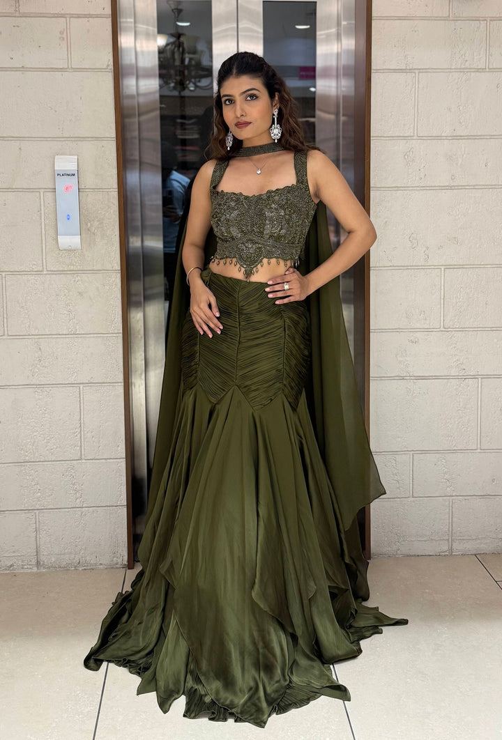 Olive Green Indo-Western Mermaid Gown with Embellished Corset & Draped Cape Sleeves