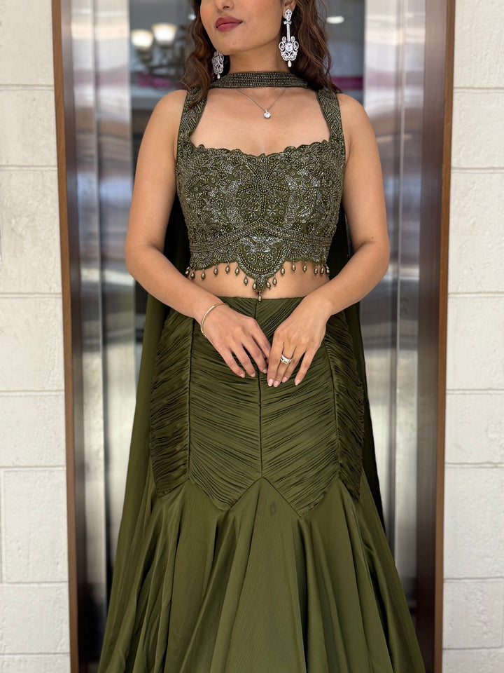 Olive Green Indo-Western Mermaid Gown with Embellished Corset & Draped Cape Sleeves