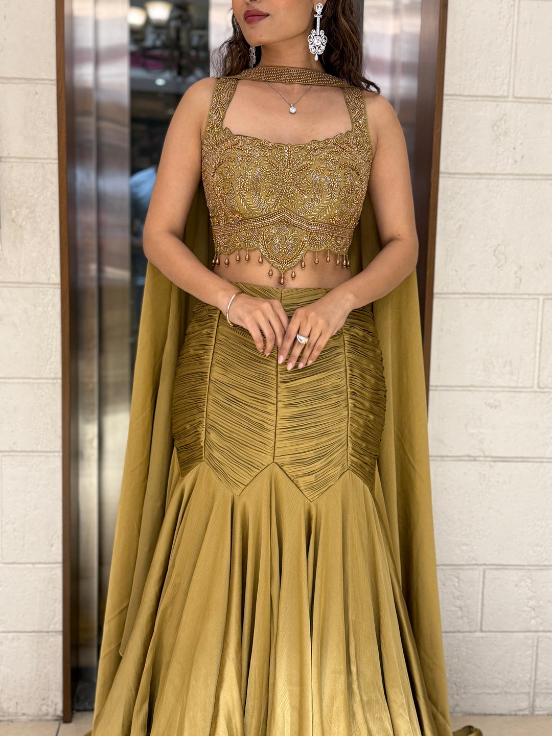 Antique Gold Indo-Western Mermaid Gown with Handcrafted Beaded Corset & Flowing Cape