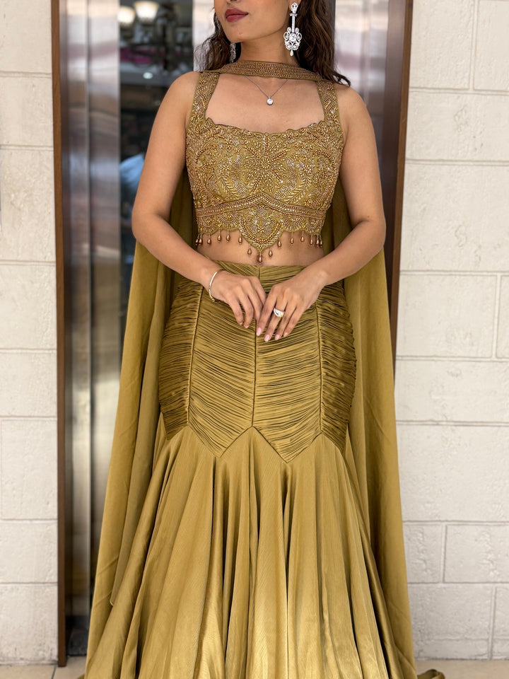 Antique Gold Indo-Western Mermaid Gown with Handcrafted Beaded Corset & Flowing Cape