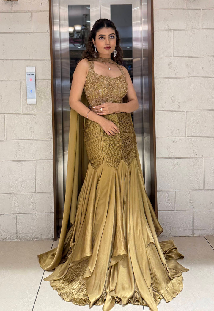 Antique Gold Indo-Western Mermaid Gown with Handcrafted Beaded Corset & Flowing Cape