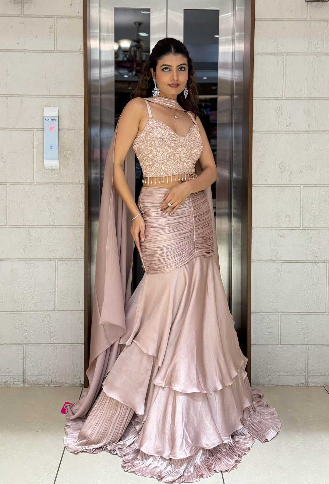 Blush Pink Indo-Western Layered Mermaid Gown with Embellished Corset & Draped Cape