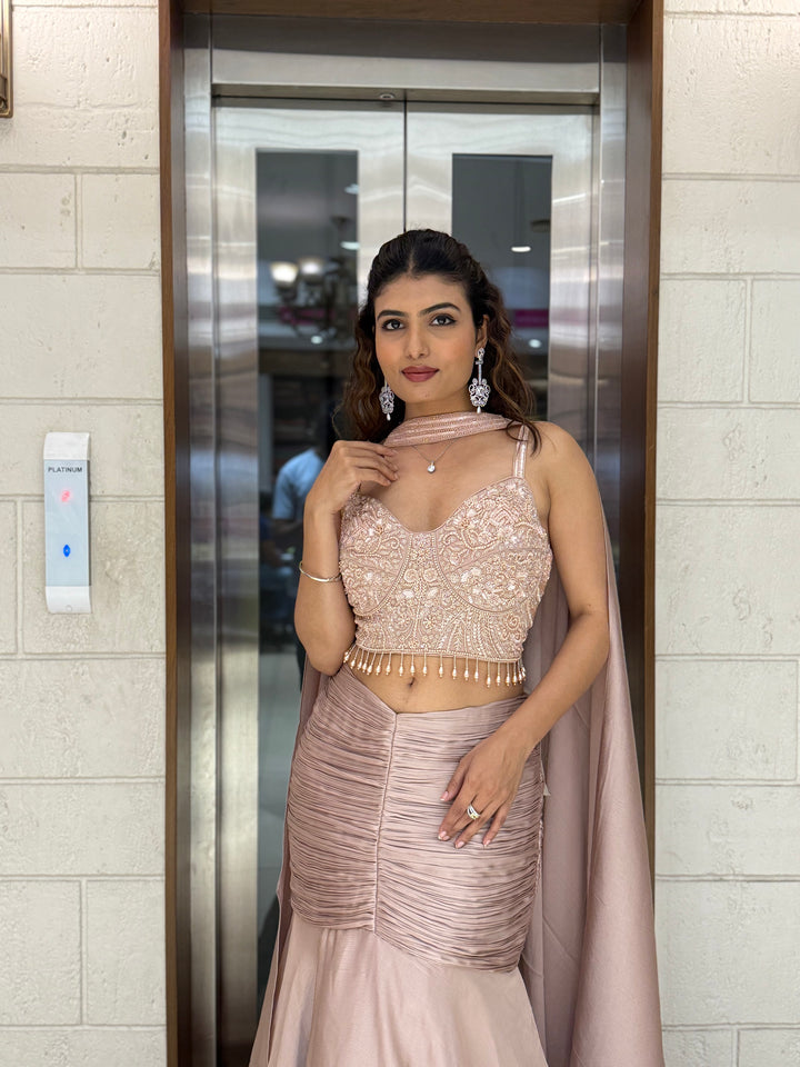 Blush Pink Indo-Western Layered Mermaid Gown with Embellished Corset & Draped Cape