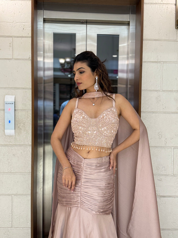 Blush Pink Indo-Western Layered Mermaid Gown with Embellished Corset & Draped Cape