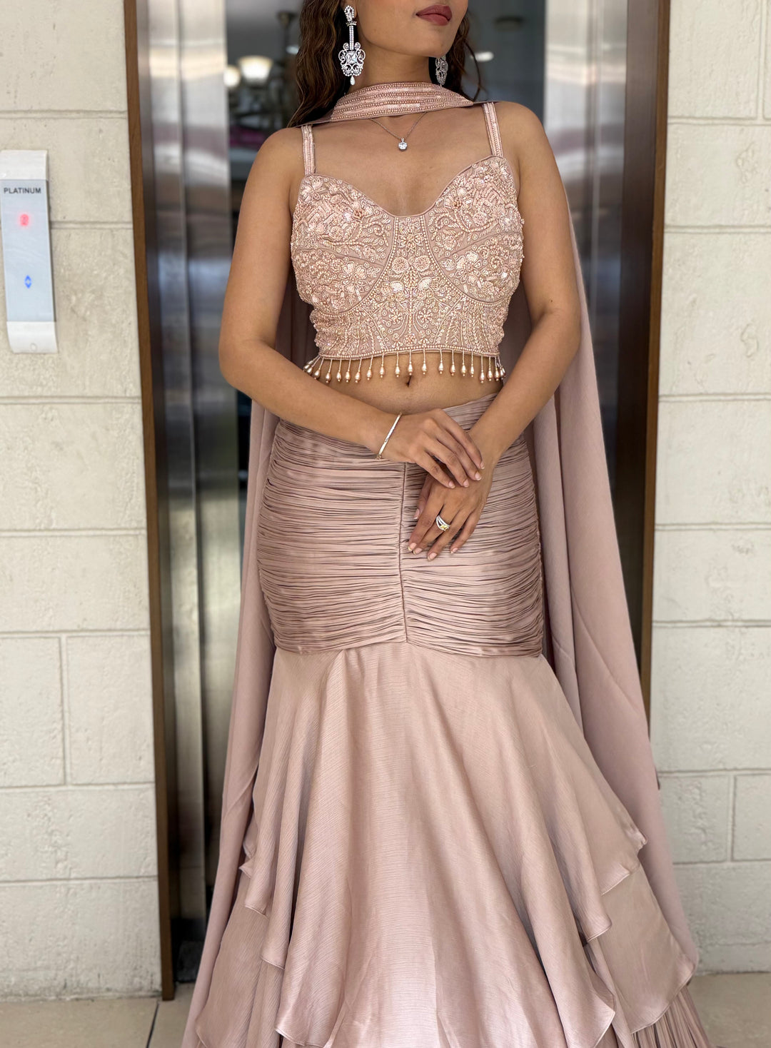 Blush Pink Indo-Western Layered Mermaid Gown with Embellished Corset & Draped Cape