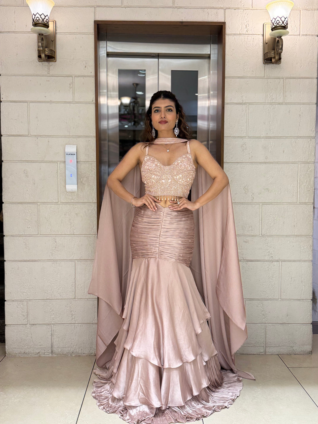 Blush Pink Indo-Western Layered Mermaid Gown with Embellished Corset & Draped Cape