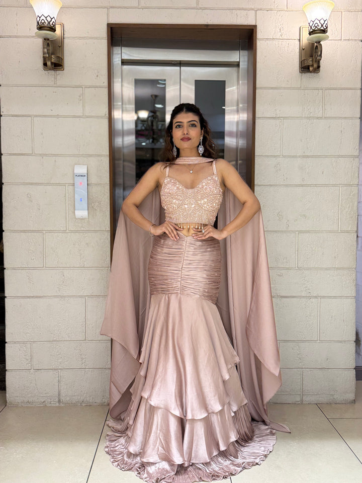 Blush Pink Indo-Western Layered Mermaid Gown with Embellished Corset & Draped Cape