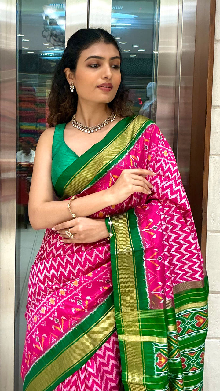 Rani Pink Ikkat Patola Silk Saree with Emerald Green Zari Border & Traditional Pallu