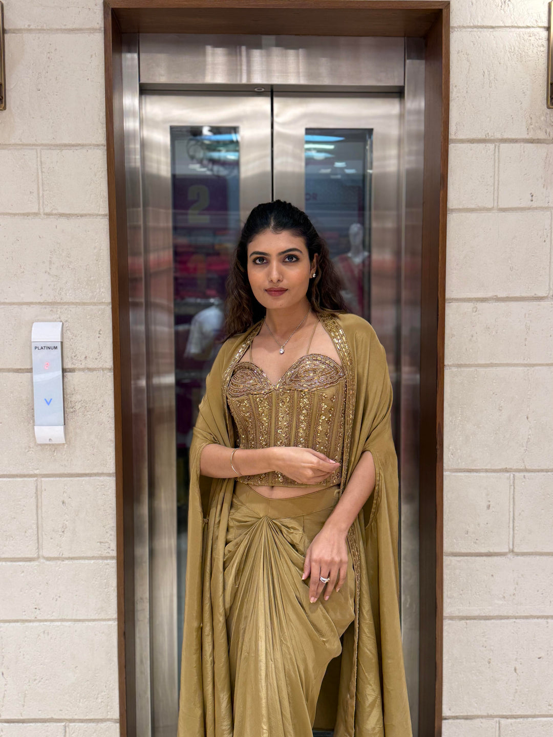 Champagne Gold Draped Saree Set with Embroidered Corset Blouse & Cape