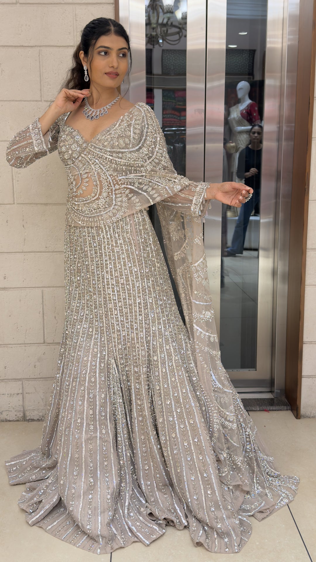 Champagne Beige Heavily Embellished Designer Lehenga with Cutwork Blouse & Net Dupatta