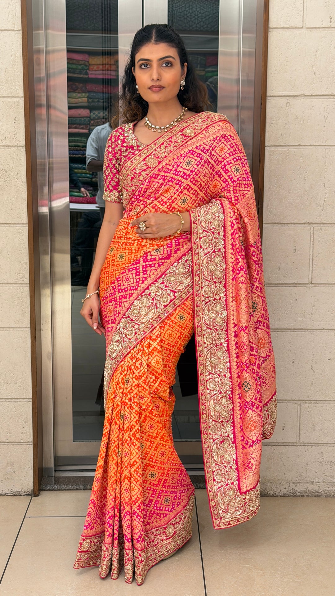 Orange Pink Bandhani Silk Saree with Heavy Zari Border