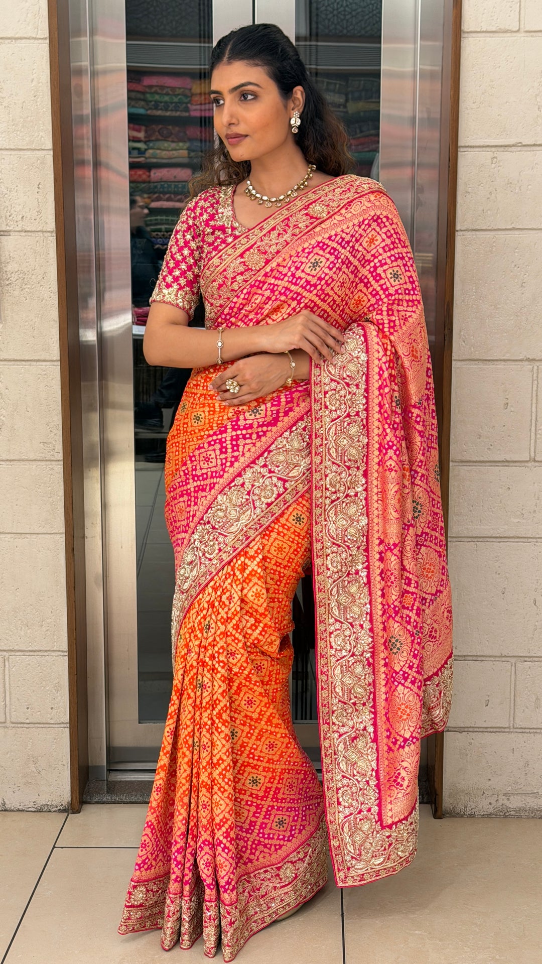 Orange Pink Bandhani Silk Saree with Heavy Zari Border