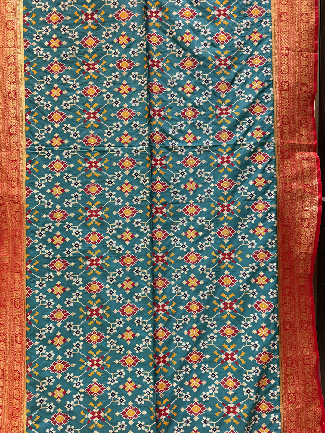 Teal Green Chowkdi Bhat Patola Saree with Phool Jaal – Double Ikat Inspired Weaving