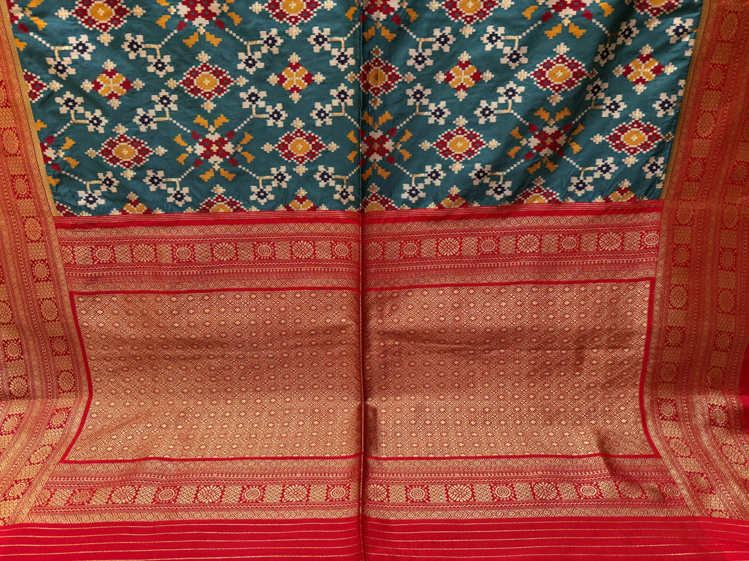 Teal Green Chowkdi Bhat Patola Saree with Phool Jaal – Double Ikat Inspired Weaving