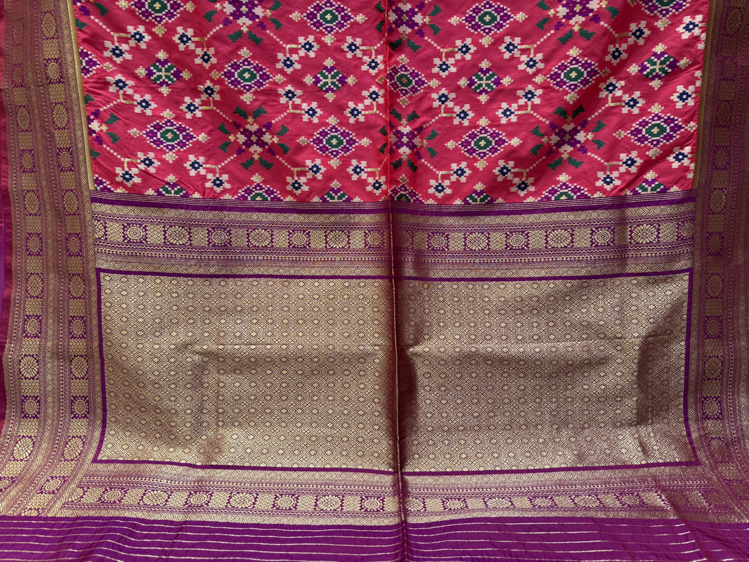 Rani Pink Chowkdi Bhat Patola Saree with Phool Jaal – Double Ikat Inspired Weaving