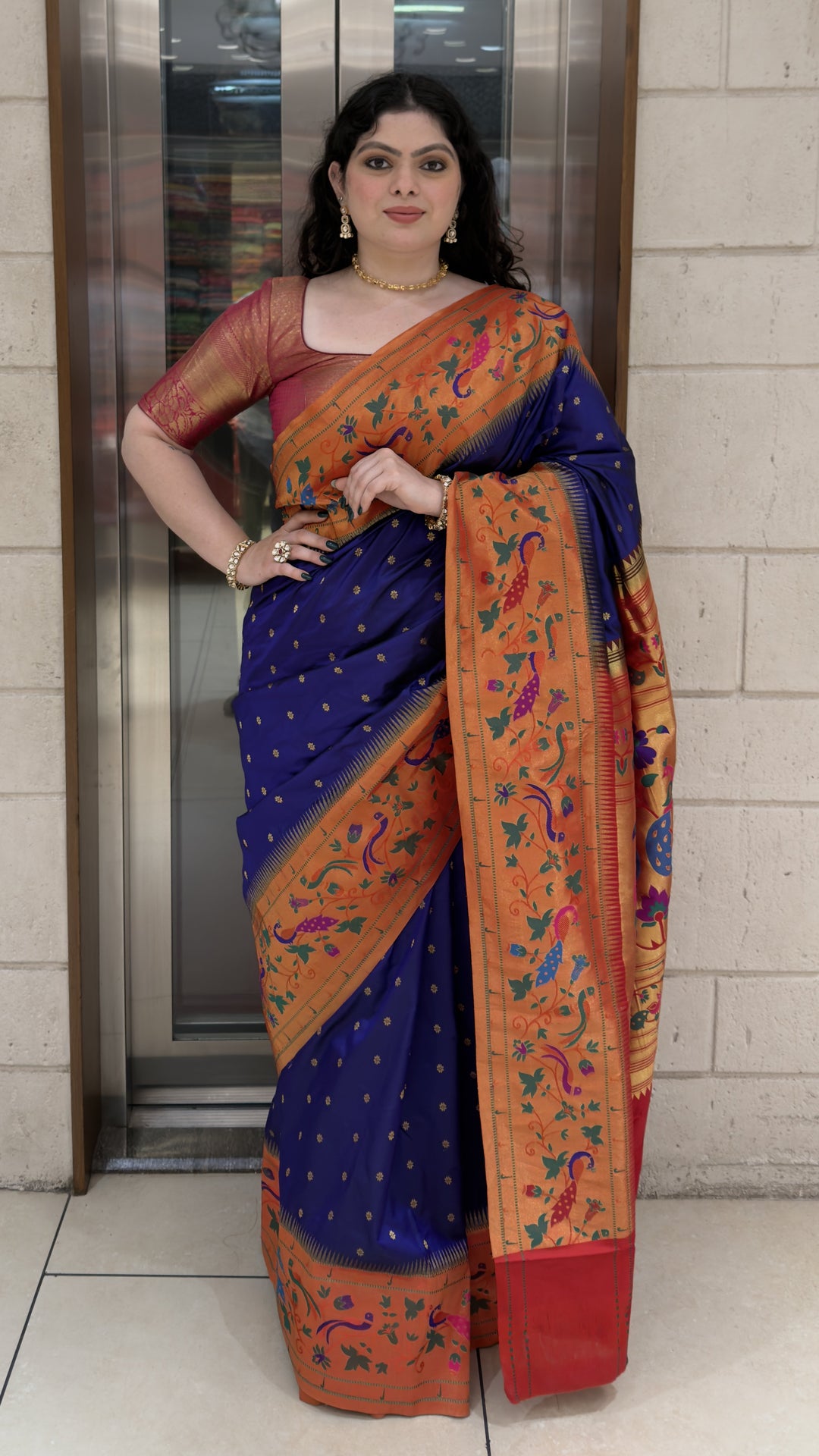 Royal Blue Paithani Silk Saree with Orange Peacock & Lotus Woven Border