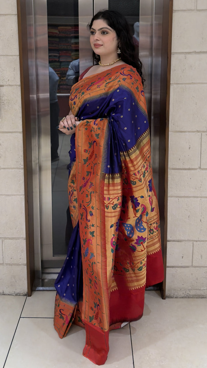 Royal Blue Paithani Silk Saree with Orange Peacock & Lotus Woven Border
