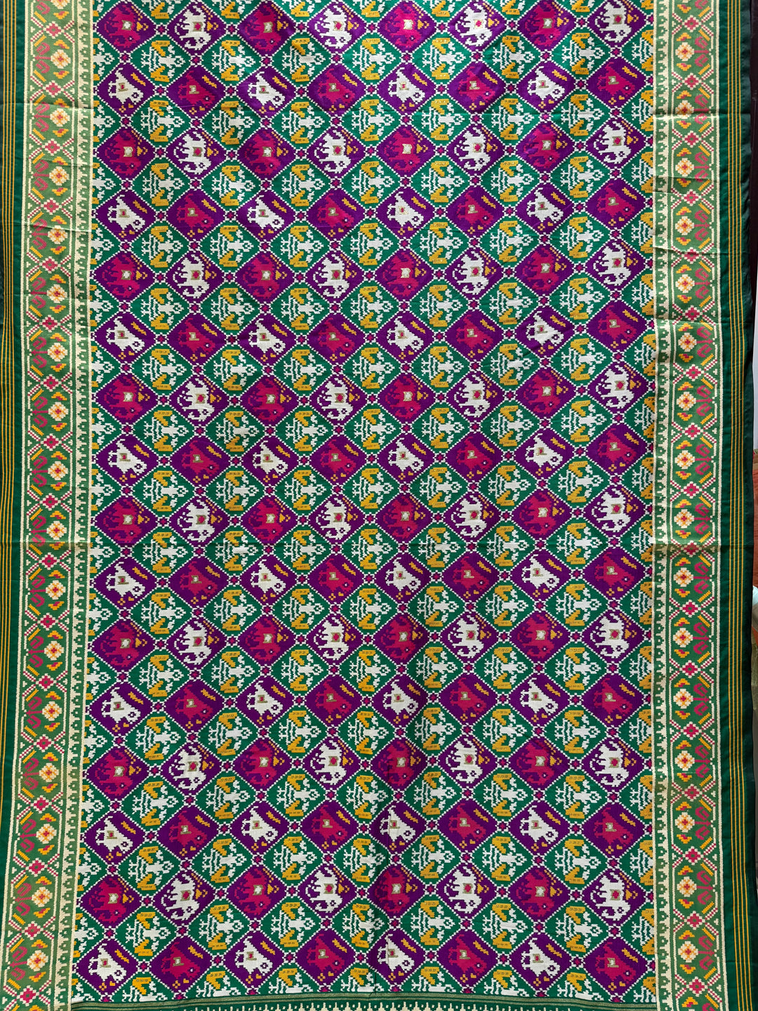 Royal Kunjar Phool Bhat Patola Inspired Saree with Traditional Floral & Elephant Motifs