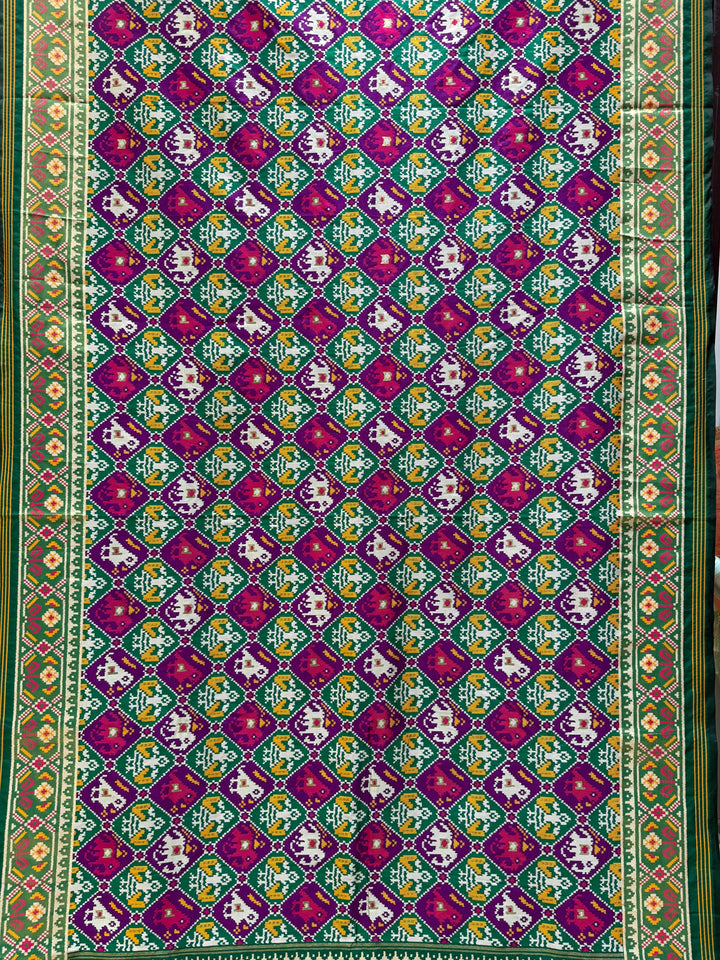 Royal Kunjar Phool Bhat Patola Inspired Saree with Traditional Floral & Elephant Motifs