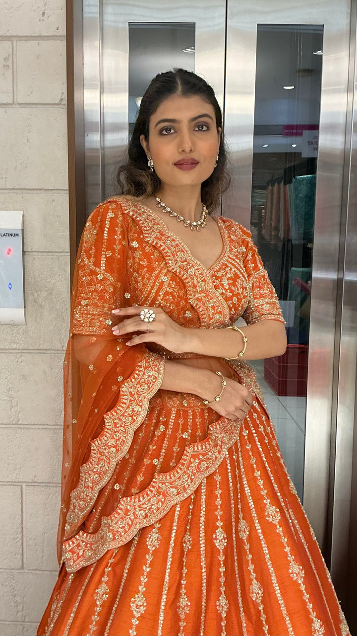 Orange Embroidered Bridal Lehenga Set with Net Dupatta