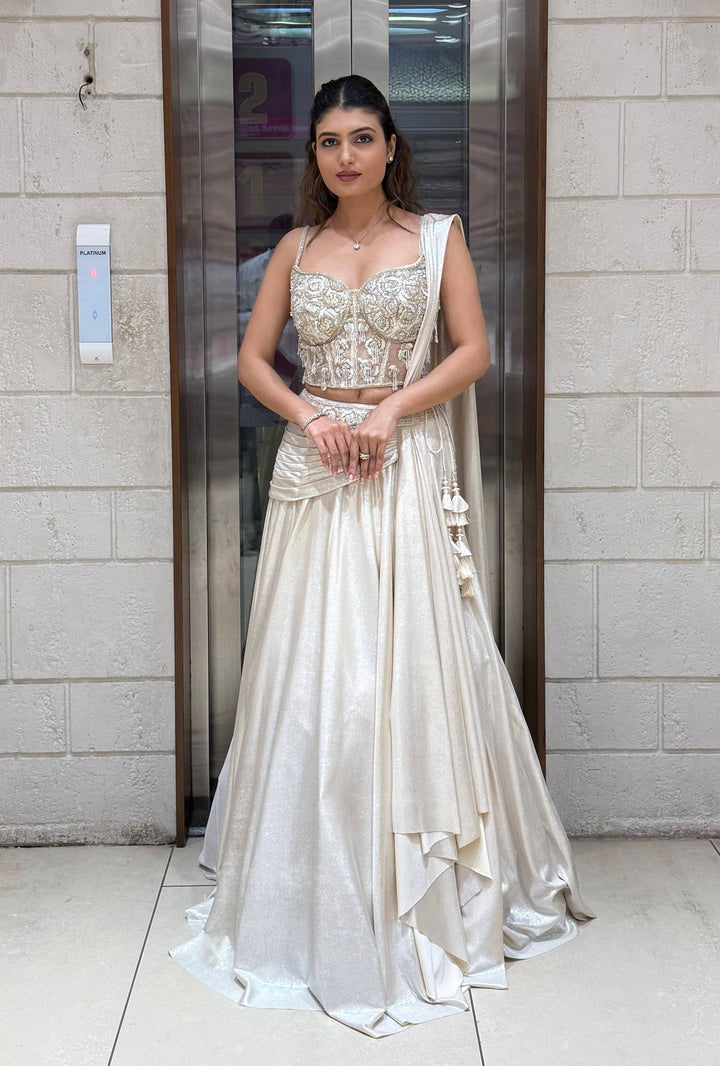 Ivory Shimmer Draped Lehenga Set with Hand-Embroidered Corset Blouse
