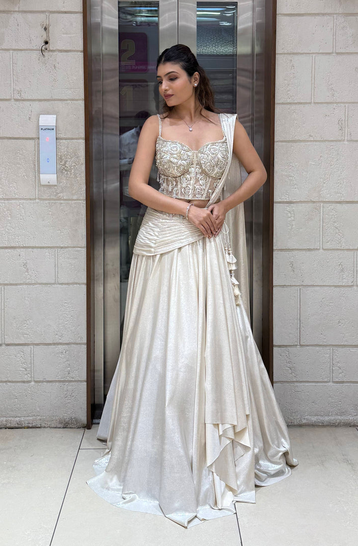 Ivory Shimmer Draped Lehenga Set with Hand-Embroidered Corset Blouse