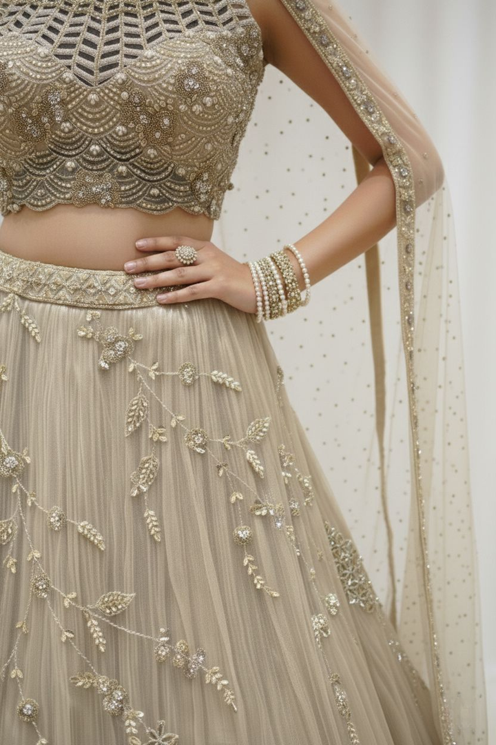 Champagne Gold Embroidered Net Lehenga Set with Cape Dupatta