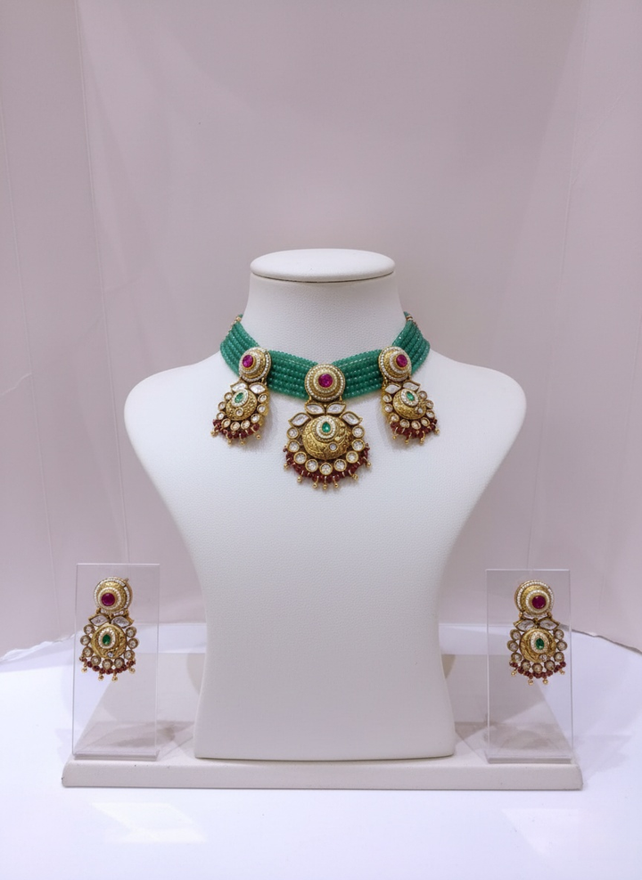 Royal Kundan Choker Necklace Set with Green Beads & Ruby Detailing